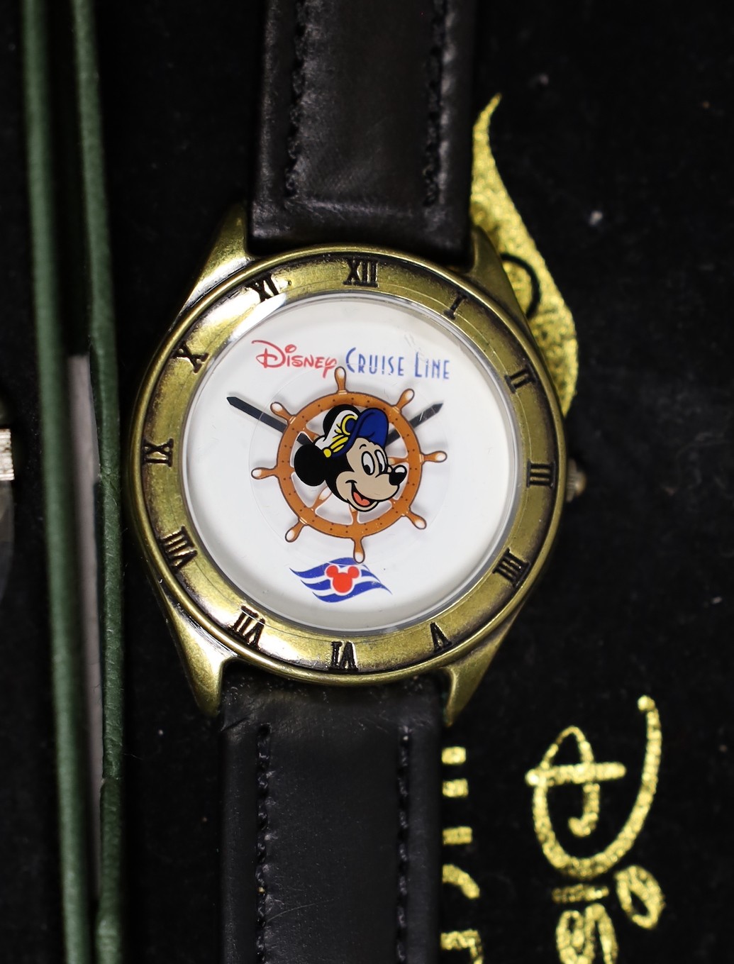 Assorted Walt Disney wristwatches including two commemorative Disney Cruise Line, 100 Years of Magic, Tarzan ride, California Adventure Park, opening of Space Mountain, Disneyland Paris (9 total)